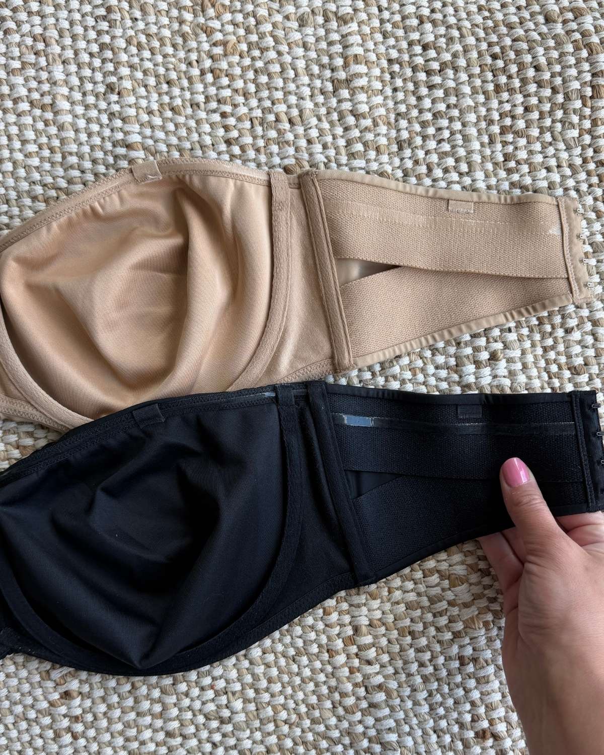 Close-up of strapless bra construction showing wide band, silicone lining, and supportive structure