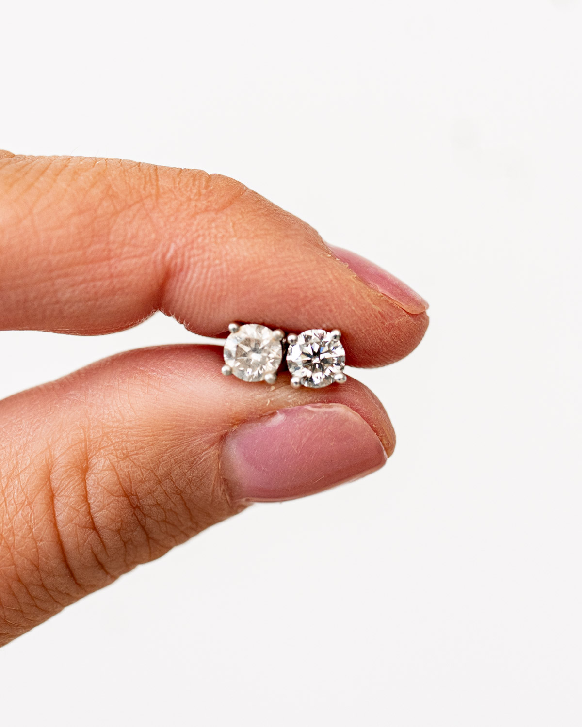 Connoisseurs Diamond Dazzle Stik Before and After Results on Diamond Earrings