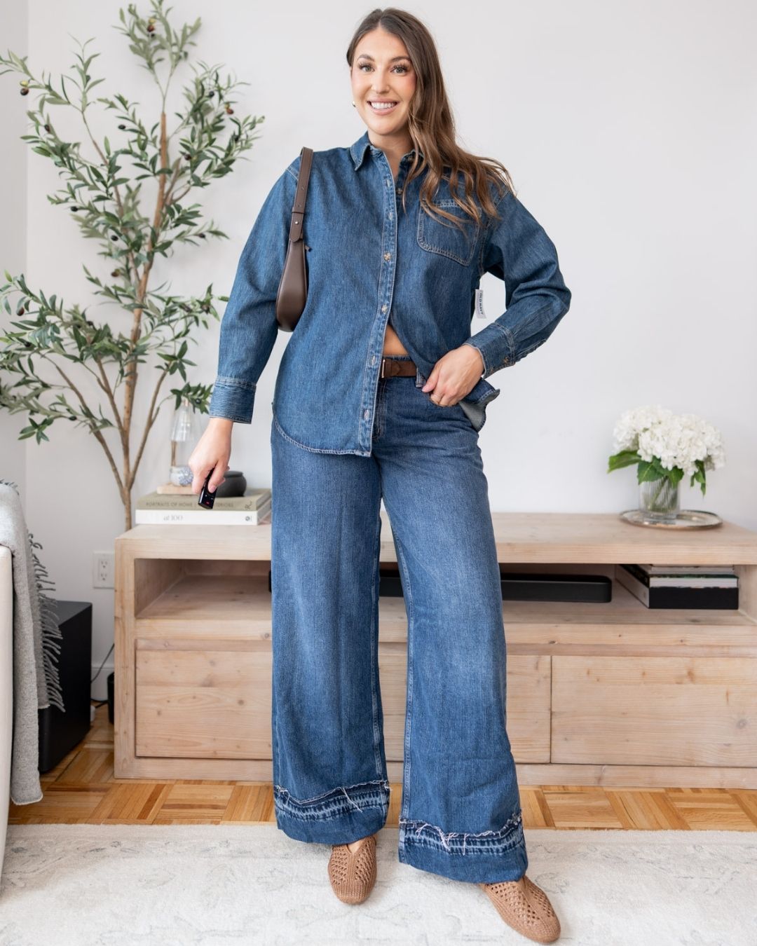 denim on denim outfit with denim button-down shirt 