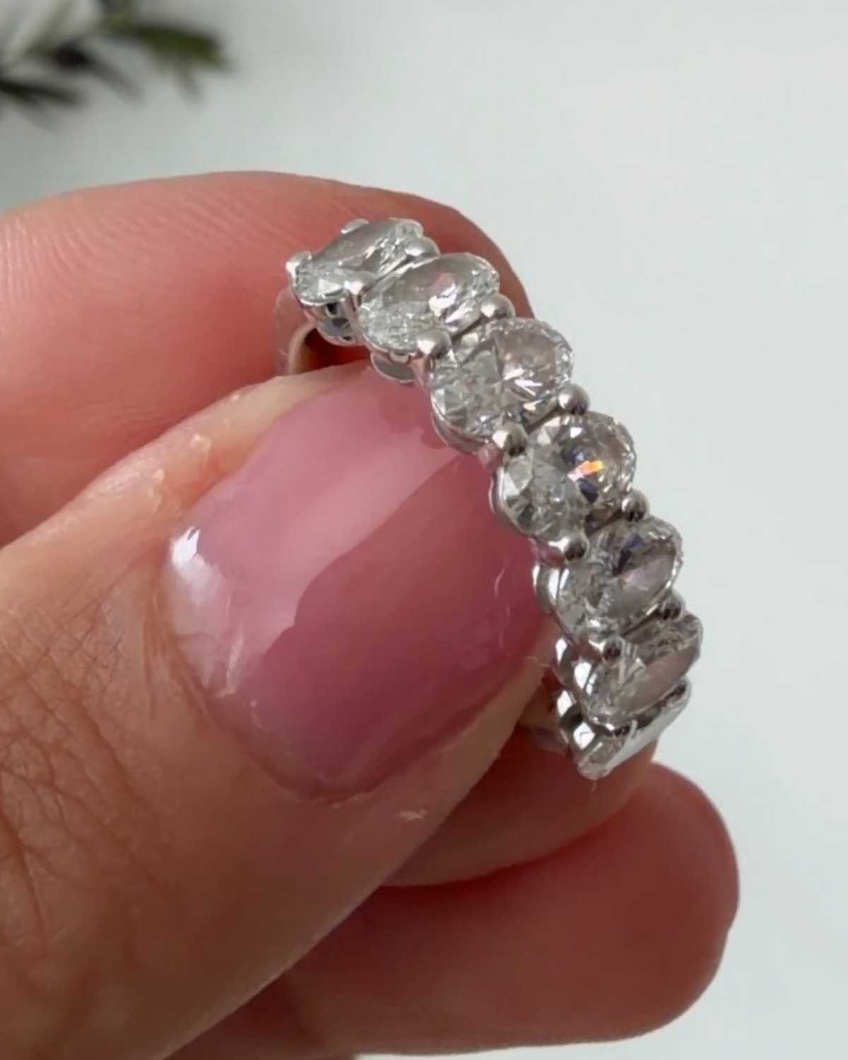 Close-up of Quince 2-carat lab grown diamond oval seven-stone ring
